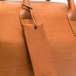 Marsell-embossed_logo_lugagge_bag-2201040283-4.jpg