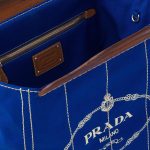 Prada-logo-print_canvas_bag-2201042459-4.jpg